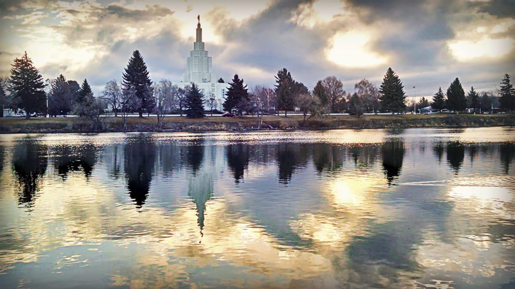 Storm moving through left this beautiful reflection of the sunrise on the Snake River of the Idaho Falls Temple.